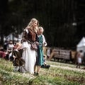 Mother and children medieval Europe. Medieval battle - historical reconstruction.