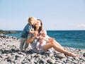 Mother with children outdoors on ocean on Tenerife, Spain. Royalty Free Stock Photo