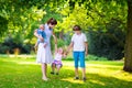 Mother and children in a park Royalty Free Stock Photo