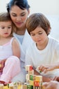 Mother and children playing Royalty Free Stock Photo