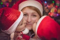 Mother and children under Christmas tree Royalty Free Stock Photo