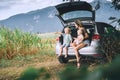 Mother and children watching on countryside. Family in road trip Royalty Free Stock Photo