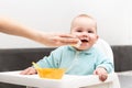 Mother Cleaning Her Son With Baby Wipes