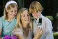 Mother Clicking Self Photo With Kids