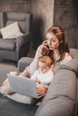 Mother combine of child`s care and remote working at home