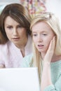 Mother Comforting Daughter Victimized By Online Bullying Royalty Free Stock Photo