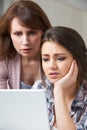 Mother Comforting Daughter Victimized By Online Bullying Royalty Free Stock Photo