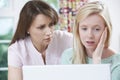 Mother Comforting Daughter Victimized By Online Bullying