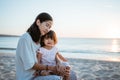 asian Mother is comforting her crying daughter Royalty Free Stock Photo