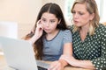 Mother Comforting Daughter Victimized By Online Bullying Royalty Free Stock Photo