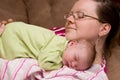 Mother Comforts Sleeping Baby Girl