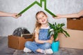 Mother creates a roof over her daughter and promises excellent protection for children. A little blonde girl moves into Royalty Free Stock Photo