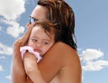 Mother cuddling small girl Royalty Free Stock Photo