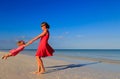 Mother and daugher playing on summer beach Royalty Free Stock Photo