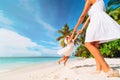 Mother and daugher playing on tropical beach Royalty Free Stock Photo