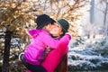 Mother and daughter in the autumn park. happy mother and daughter