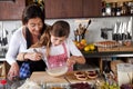 Mother and daughter baking at home Royalty Free Stock Photo