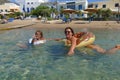 Mother and daughter bathe in the crystal clear sea of Kapsali in the south of the island of Kythira