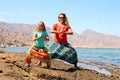 Mother with daughter on beach