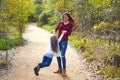 Mother and daughter being spun in circles