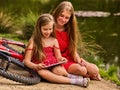 Mother and daughter on bicycle. Bikes cycling family. Royalty Free Stock Photo