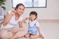 Mother and daughter brushing their teeth Royalty Free Stock Photo