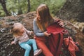 Mother and daughter child family lifestyle outdoor in forest