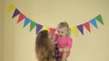 Mother and daughter child girl play and dance together. 4K