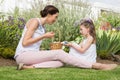 Mother and daughter collecting easter eggs Royalty Free Stock Photo