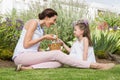 Mother and daughter collecting easter eggs Royalty Free Stock Photo