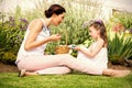 Mother and daughter collecting easter eggs Royalty Free Stock Photo