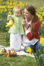 Mother And Daughter With Decorated Easter Eggs