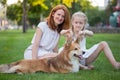 Mother, daughter and dog