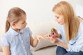 Mother and daughter doing manicure Royalty Free Stock Photo