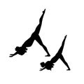 Mother and daughter doing yoga workout silhouette