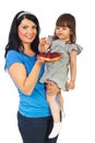 Mother with daughter eating fruit tart Royalty Free Stock Photo