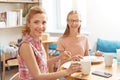 Mother and daughter enjoying cup of tea together Royalty Free Stock Photo