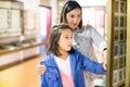 Mother and daughter enjoying medieval expositions Royalty Free Stock Photo