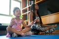 Mother and daughter exercising together at home. Royalty Free Stock Photo