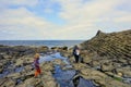A mother and daughter exploring the tidal pools off of North Beach, in Naikoon Provincial Park