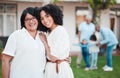 Mother, daughter and family hug outside a home or house feeling happy and excited together and bonding. Love, care and Royalty Free Stock Photo