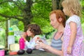 Mother daughter family picnic outdoor park