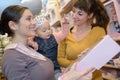 Mother daughter and friend shopping for homeware