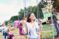 Mother and daughter at fun fair, chain swing ride Royalty Free Stock Photo
