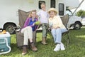 Mother, Daughter And Granddaughter Outside RV Home