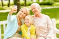 Mother with daughter and grandmother at park Royalty Free Stock Photo