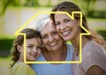 Mother, daughter and grandmother smiling together in the park with house outline