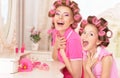 Mother and daughter in hair curlers Royalty Free Stock Photo