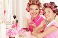 Mother and daughter in hair curlers Royalty Free Stock Photo