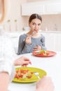 Mother and daughter have lunch Royalty Free Stock Photo